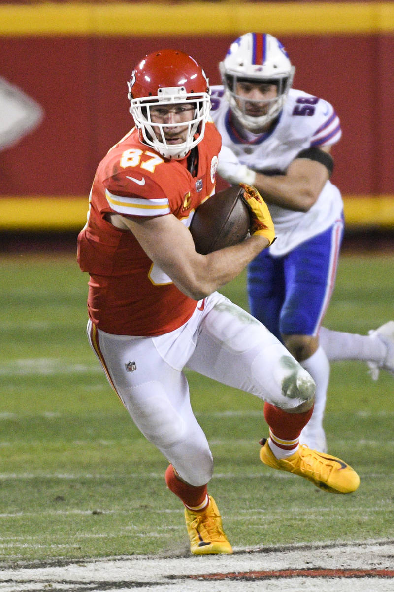 Kansas City Chiefs tight end Travis Kelce makes a catch and run for a first down against the Bu ...