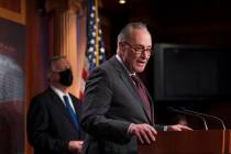 Senate Majority Leader Chuck Schumer, D-N.Y., joined at left by Sen. Dick Durbin, D-Ill., the m ...