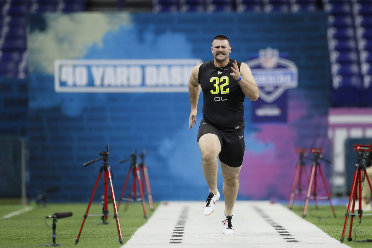 Boise State offensive lineman John Molchon runs the 40-yard dash at the NFL football scouting c ...