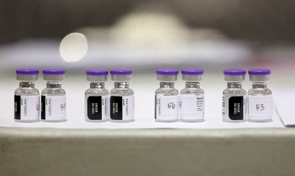 Pfizer vaccine thaws to room temperature at the Cashman Center COVID-19 vaccination site in Las ...