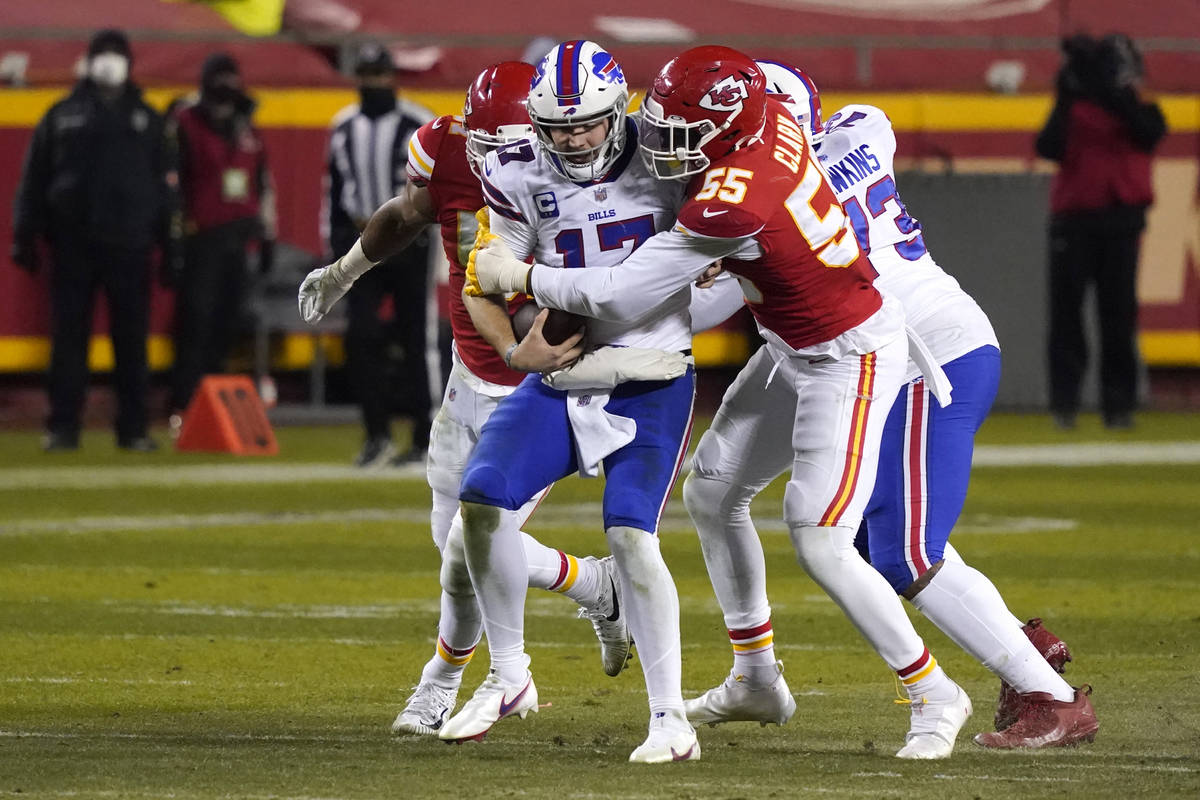Buffalo Bills quarterback Josh Allen (17) is sacked by Kansas City Chiefs defensive end Frank C ...