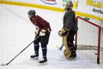 Vegas Golden Knights right wing Alex Tuch (89) waits for the puck in front of goaltender Marc-A ...
