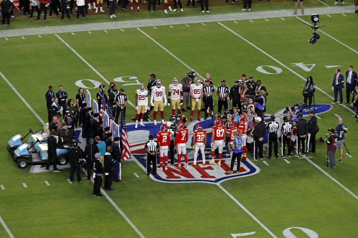 The coin toss between the San Francisco 49ers and the Kansas City Chiefs prior to the NFL Super ...