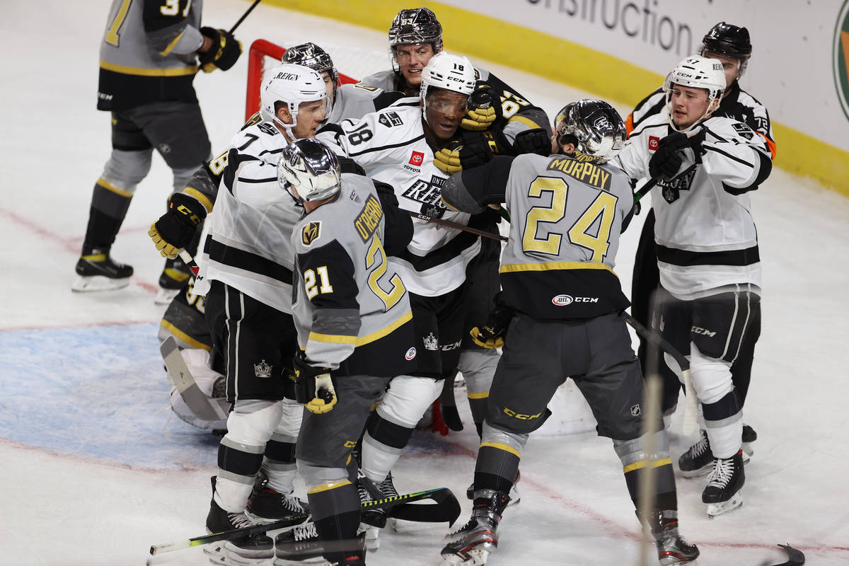The Henderson Silver Knights and the Ontario Reign players get physical with each other during ...
