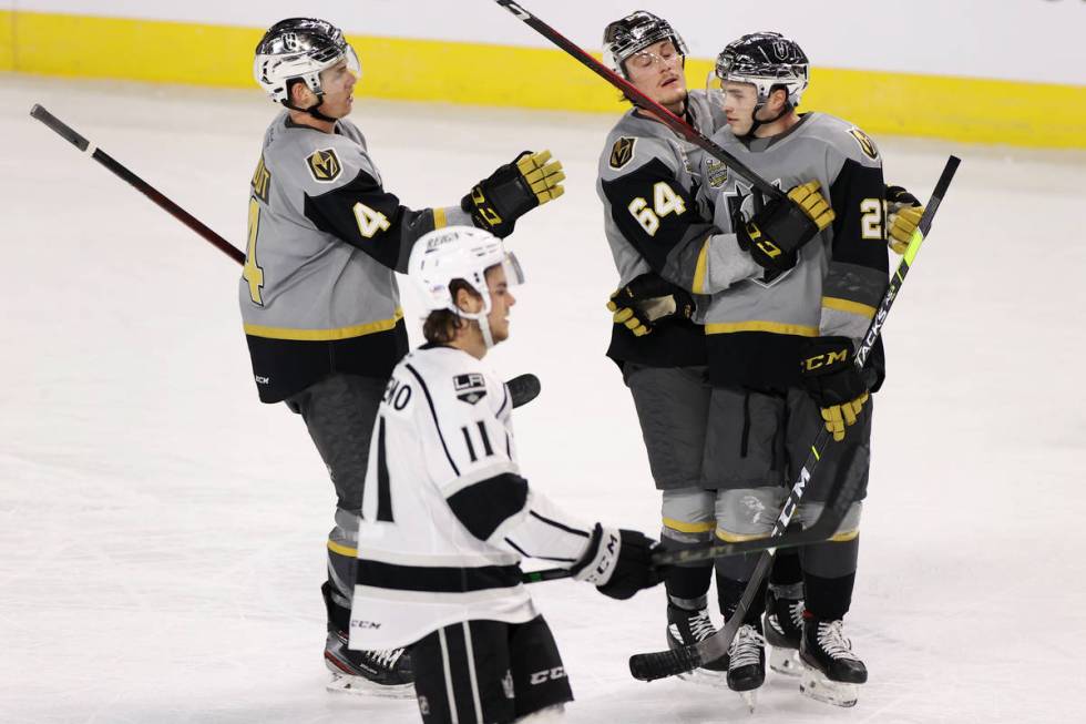 Henderson Silver Knights forward Danny O'Regan (21) celebrates an empty net goal with teammates ...