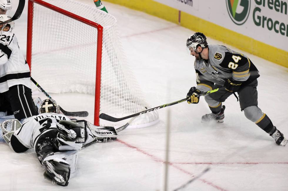 Henderson Silver Knights defenseman Ryan Murphy (24) attempts a shot at the goal against Ontari ...