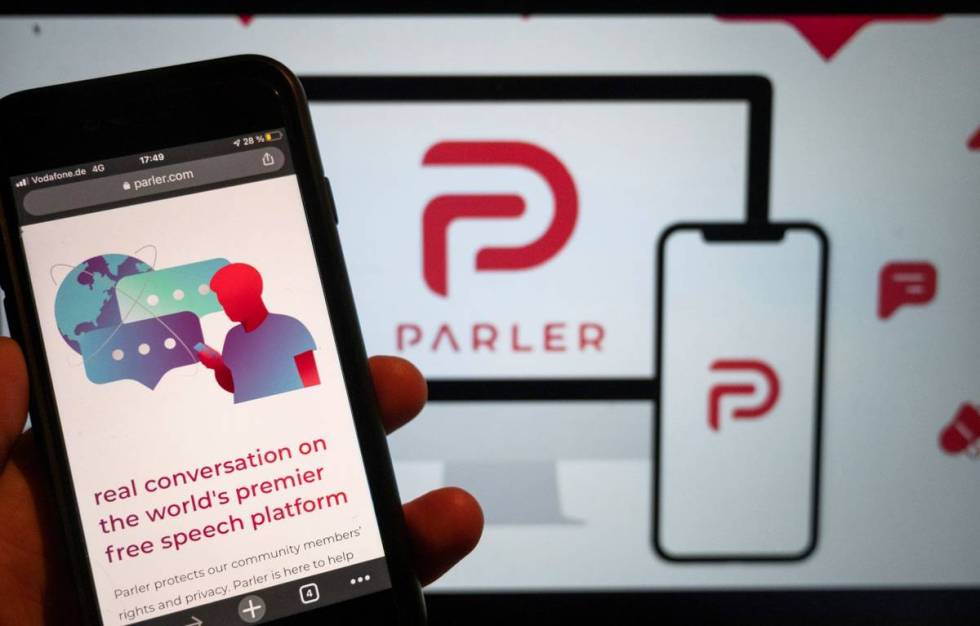 The website of the social media platform Parler is displayed in Berlin. (Christophe Gateau/dpa ...