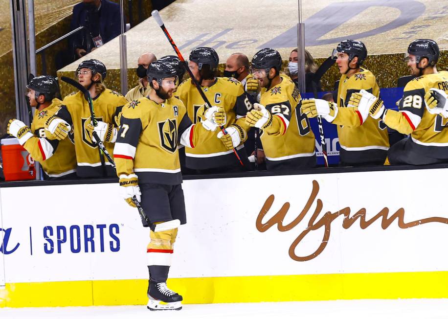 Golden Knights defenseman Alex Pietrangelo (7) celebrates his goal with teammates during the fi ...