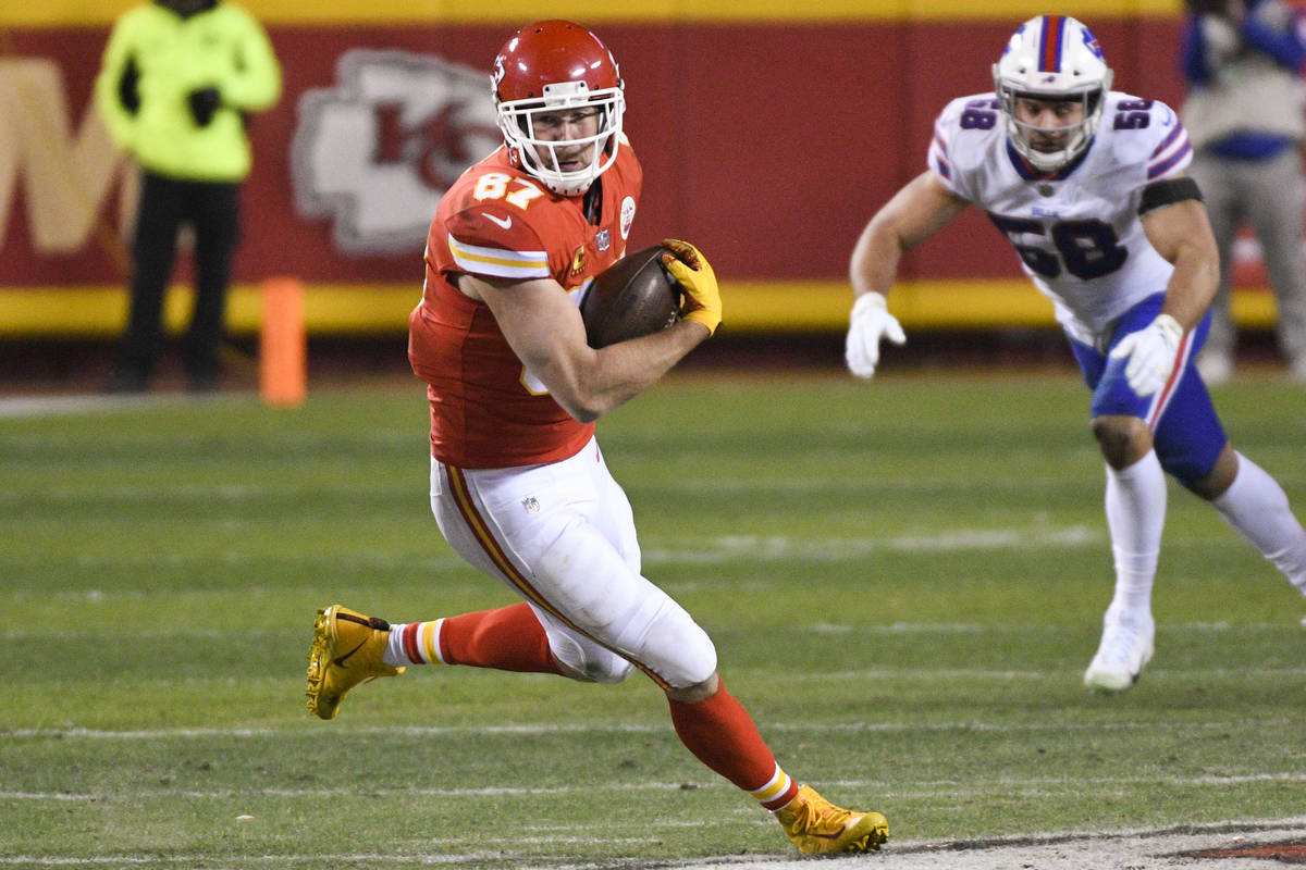 Kansas City Chiefs tight end Travis Kelce makes a catch and run for a first down against the Bu ...