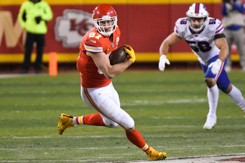 Kansas City Chiefs tight end Travis Kelce makes a catch and run for a first down against the Bu ...