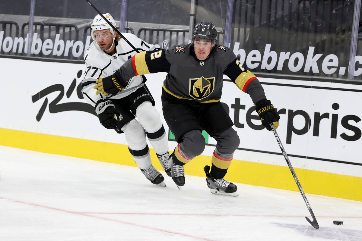 Vegas Golden Knights defenseman Zach Whitecloud (2) clears the puck away from the goal against ...