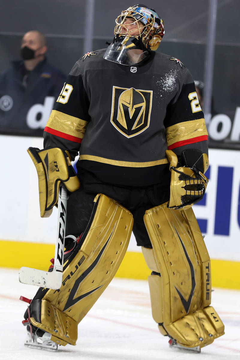 Vegas Golden Knights goaltender Marc-Andre Fleury (29) looks at the game replay after allowing ...
