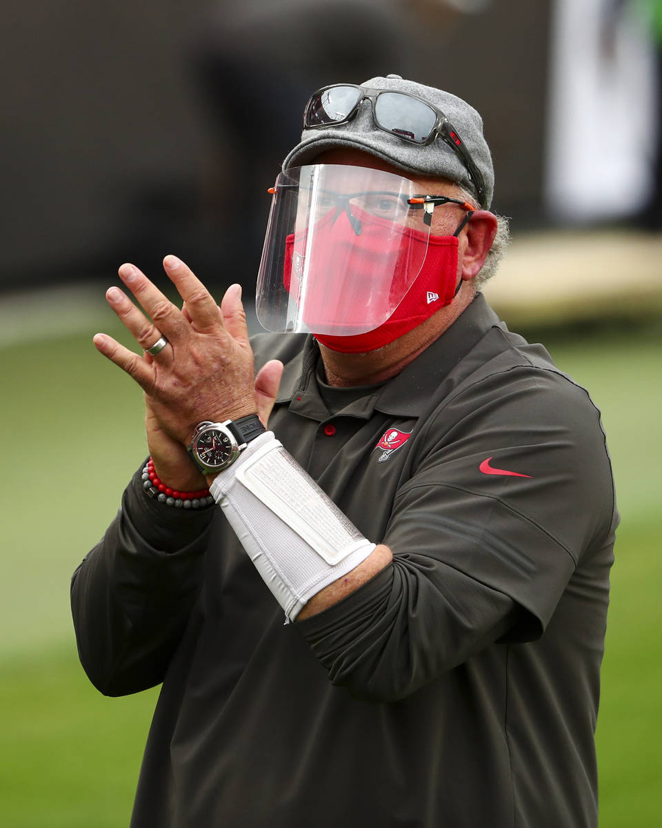 Tampa Bay Buccaneers head coach Bruce Arians walks to the locker room after beating the Atlanta ...