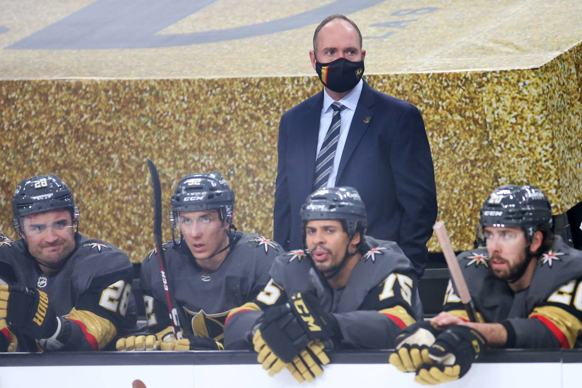 Vegas Golden Knights head coach Peter DeBoer, center, during the second period of an NHL hockey ...