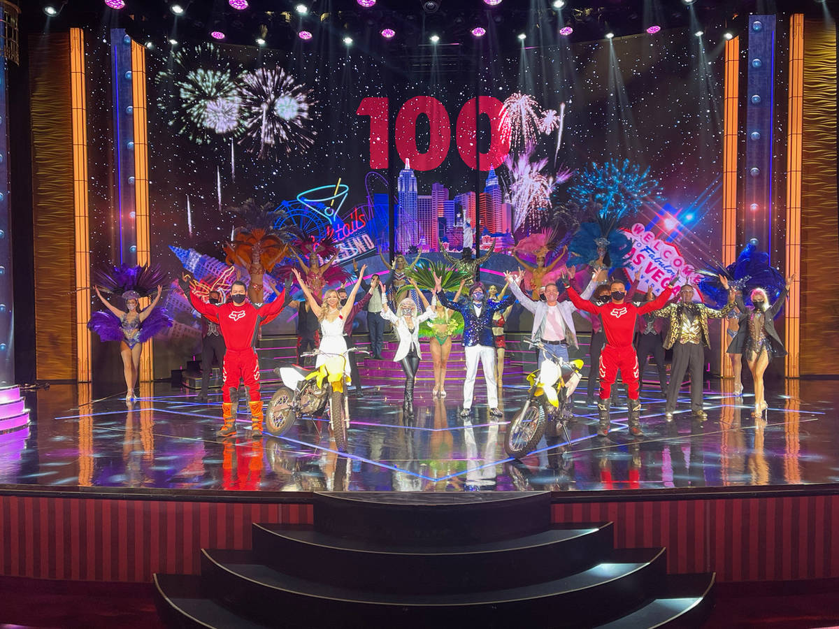 The cast of "Extravaganza" celebrates its 100th show at Bally's on Friday, Feb. 5, 2021. (Dov N ...