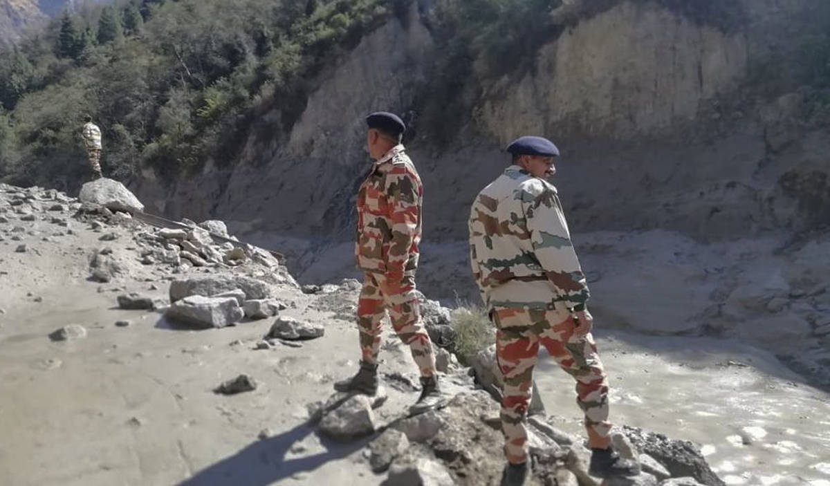 This photograph provided by Indo Tibetan Border Police (ITBP) shows ITBP personnel arriving for ...