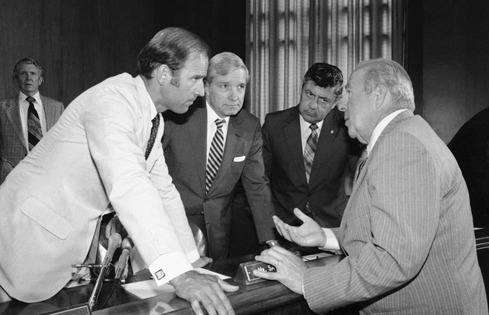 FILE - In this July 13, 1982, file photo Secretary of State designate George Shultz, right, spe ...