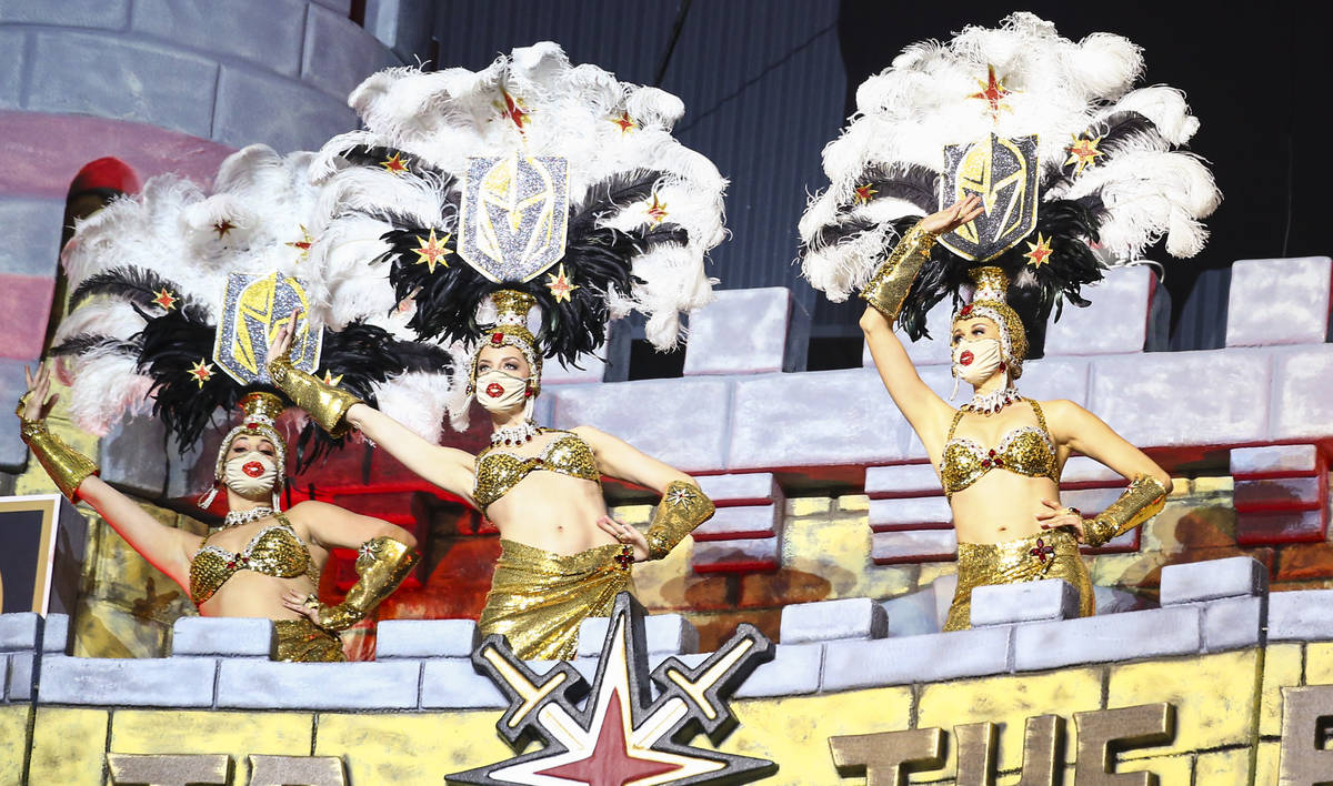 The Golden Belles perform during the first period of an NHL hockey game against the Los Angeles ...