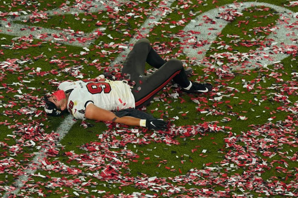 Tampa Bay Buccaneers' Anthony Nelson (98) lies on the field at the end of the NFL Super Bowl 55 ...