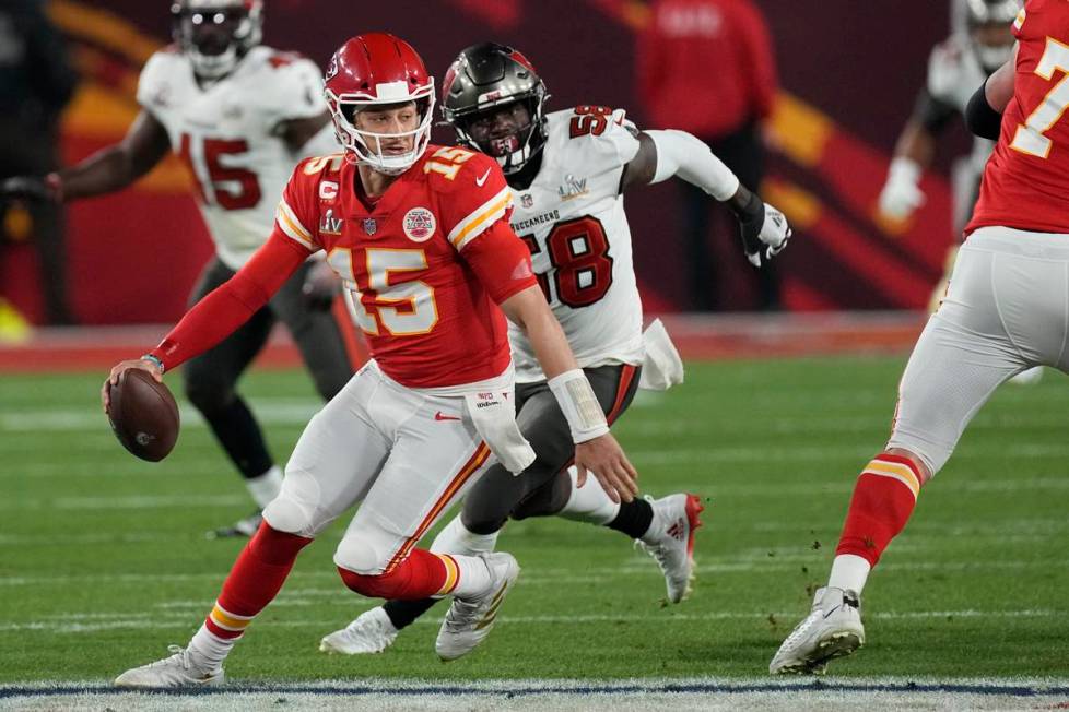 Kansas City Chiefs quarterback Patrick Mahomes looks to throw against the Tampa Bay Buccaneers ...