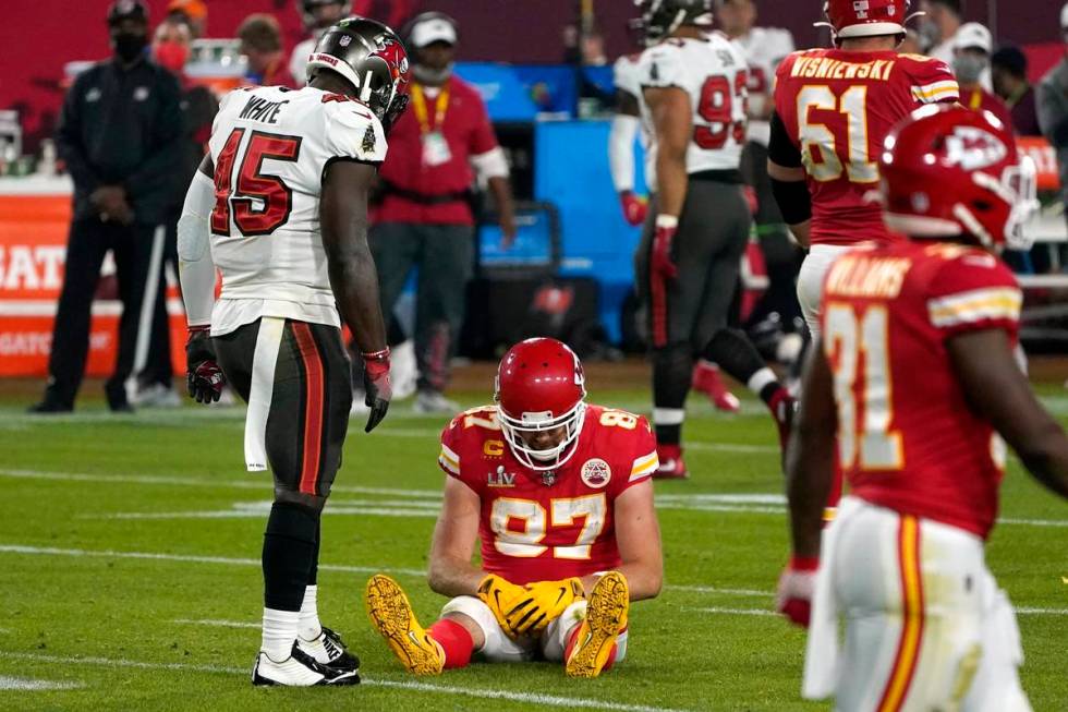 Kansas City Chiefs tight end Travis Kelce (87) sits on the field after an incomplete pass as Ta ...