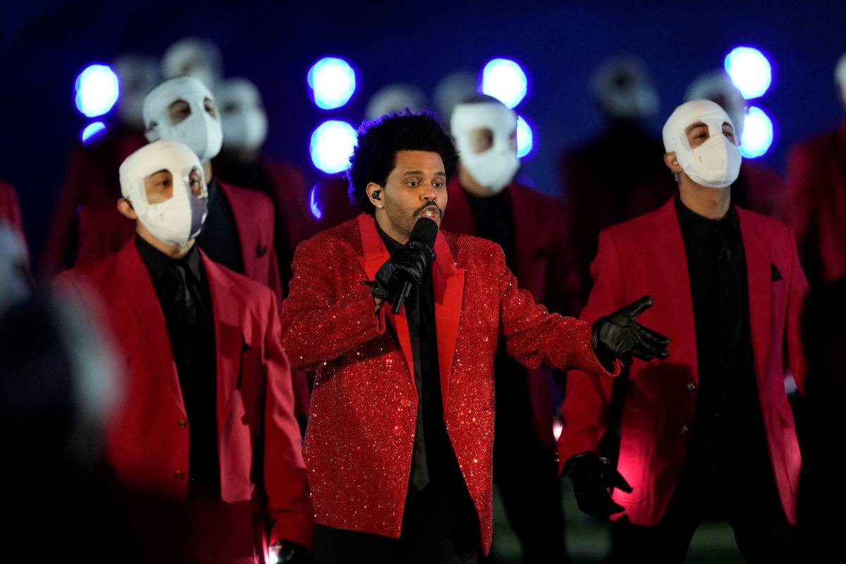 The Weeknd performs during halftime of the NFL Super Bowl 55 football game between the Kansas C ...