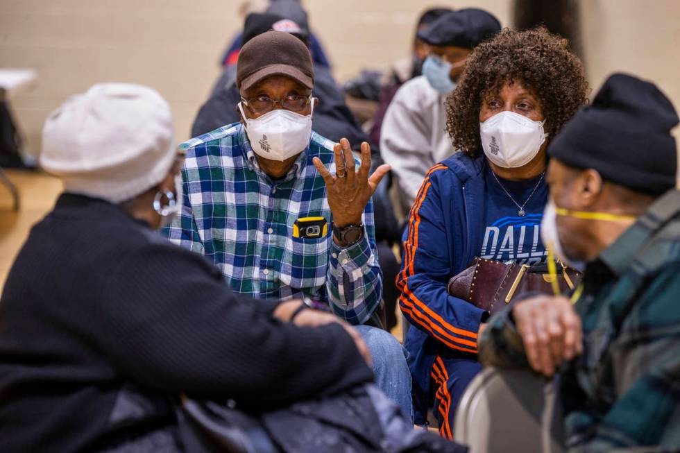 Wilbur and Nanette Hines, center, chat with Norma Smith, left, and husband Alvin smith, right, ...