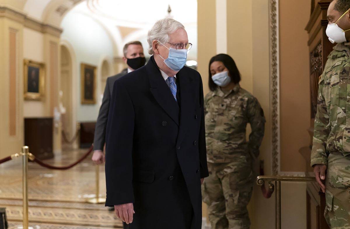 Senate Minority Leader Mitch McConnell, R-Ky., arrives for work as the second impeachment trial ...