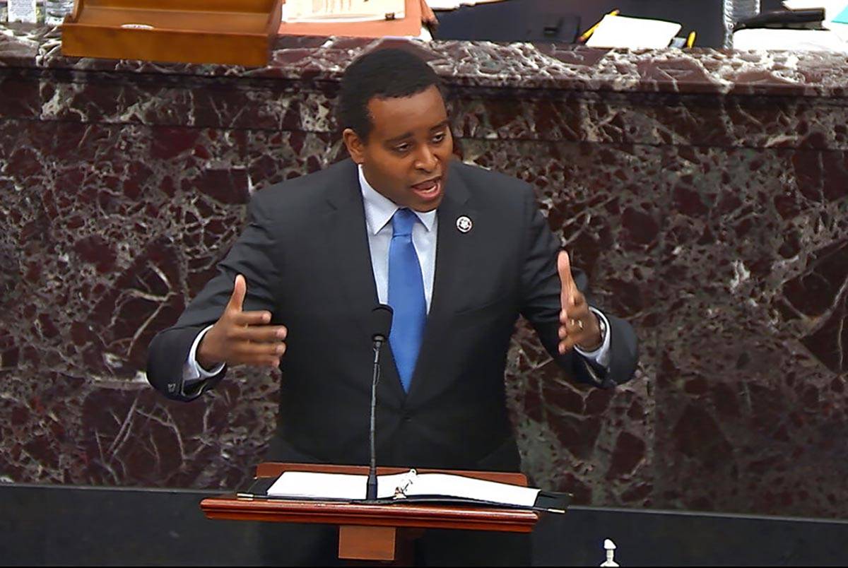 In this image from video, House impeachment manager Rep. Joe Neguse, D-Colo., speaks during the ...