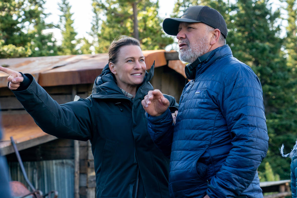 Director and actor Robin Wright with director of photography Bobby Bukowski on the set of "Land ...