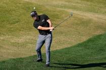 Patrick Cantlay chips to the 16th hole during the final round of The American Express golf tour ...