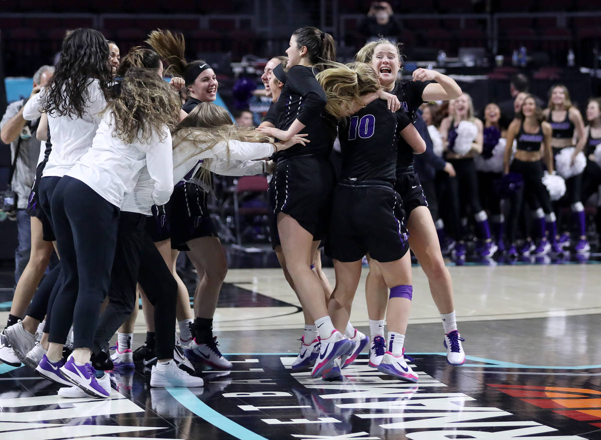 The Portland Pilots celebrate after winning the West Coast Conference championship against the ...