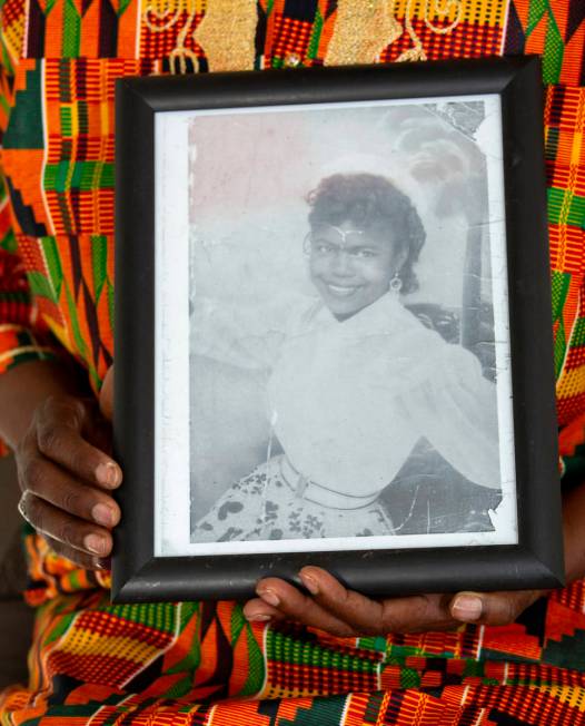 Yvonne Wesley, daughter of Black activist Mary Wesley, holds her mother's photo at her home on ...