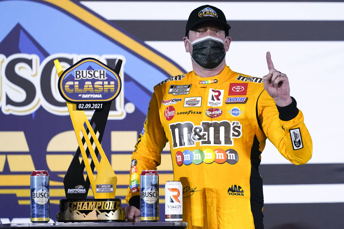Kyle Busch celebrates in Victory Lane after winning the NASCAR Clash auto race at Daytona Inter ...