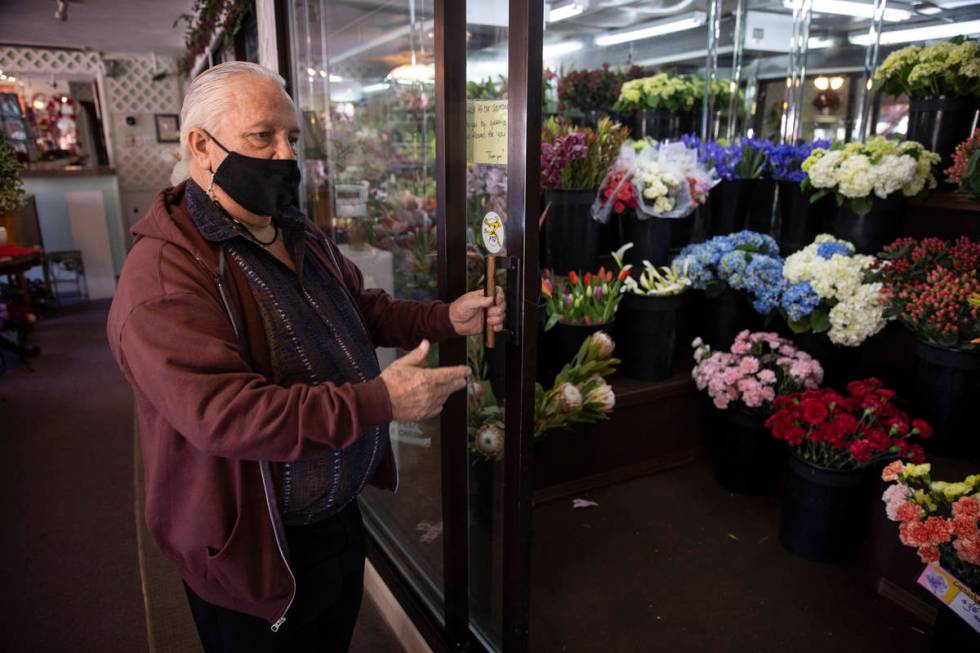John DiBella, co-owner of DiBella Flowers & Gifts, gives a tour of his Las Vegas shop while ...