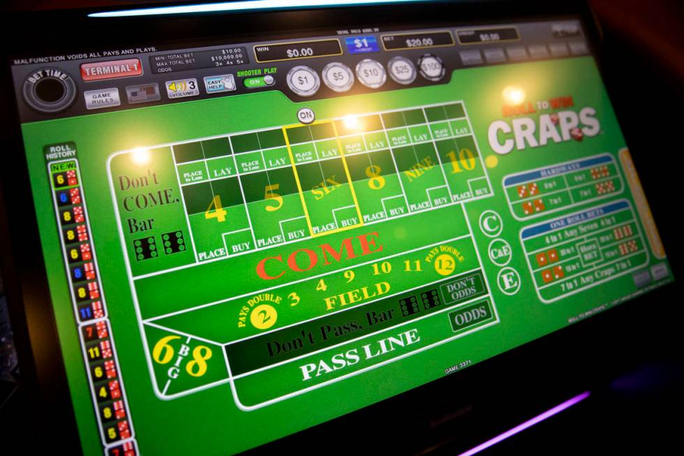 A player's screen of the new digital craps table, Rolls to Win Craps, at the Harrah's Las Vegas ...