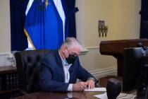 Gov. Steve Sisolak during a virtual signing ceremony for AB 106 inside the Nevada Capitol build ...