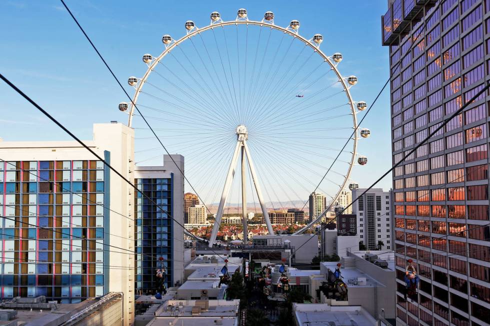 Guests on the Fly Linq Zipline at the Linq Hotel in Las Vegas, Thursday, Nov. 1, 2018. (Rachel ...