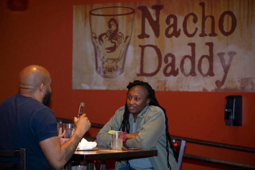 Las Vegas local Seqoiya Burress eats dinner with her husband Louis Burress at Nacho Daddy on Fe ...