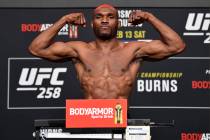 Kamaru Usman of Nigeria poses on the scale during the UFC weigh-in at UFC APEX on Friday, Feb.1 ...