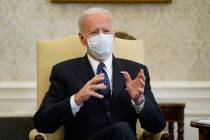 In a Feb. 9, 2021, photo, President Joe Biden meets with business leaders to discuss a coronavi ...