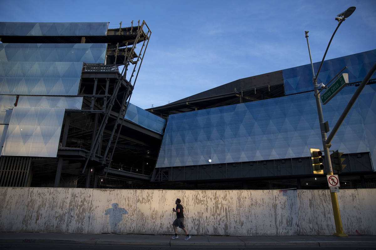A man runs past the unfinished Fontainebleau project on the Las Vegas Strip, Wednesday, Dec. 13 ...