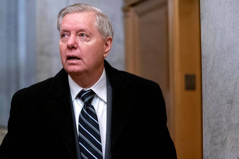 Sen. Lindsey Graham, R-S.C., arrives on Capitol Hill in Washington, Saturday, Feb. 13, 2021, on ...