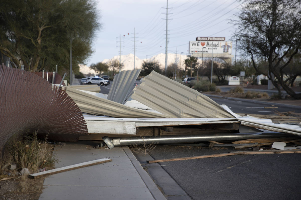 A fallen movie screen from the West Wind Las Vegas Drive-In blocks the westbound lanes of West ...