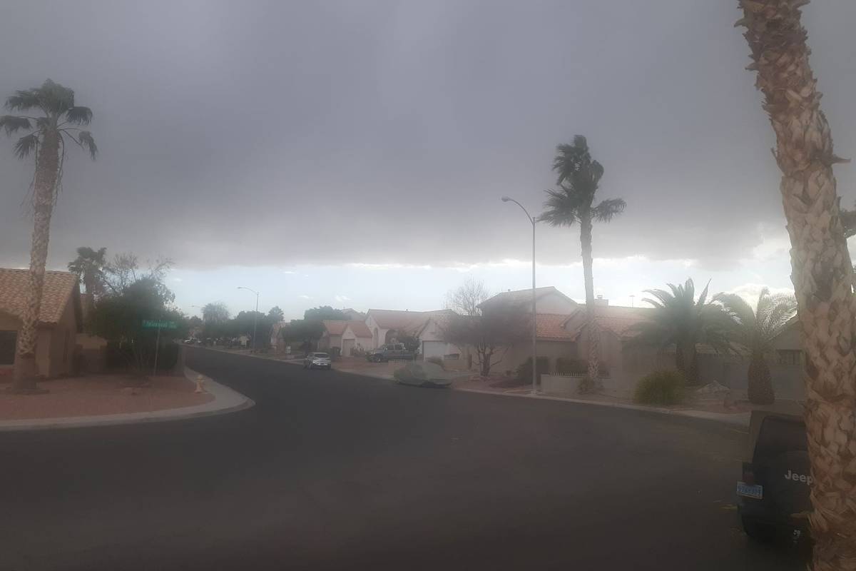 A storm moves through a neighborhood near 215 and Windmill in Las Vegas on Saturday, Feb. 13, 2 ...