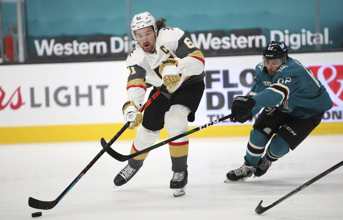 Vegas Golden Knights right wing Mark Stone (61) moves the puck downice against San Jose Sharks ...