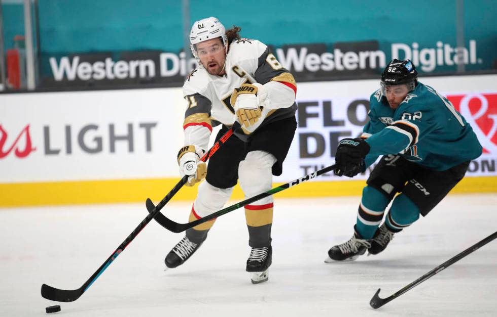 Vegas Golden Knights right wing Mark Stone (61) moves the puck downice against San Jose Sharks ...