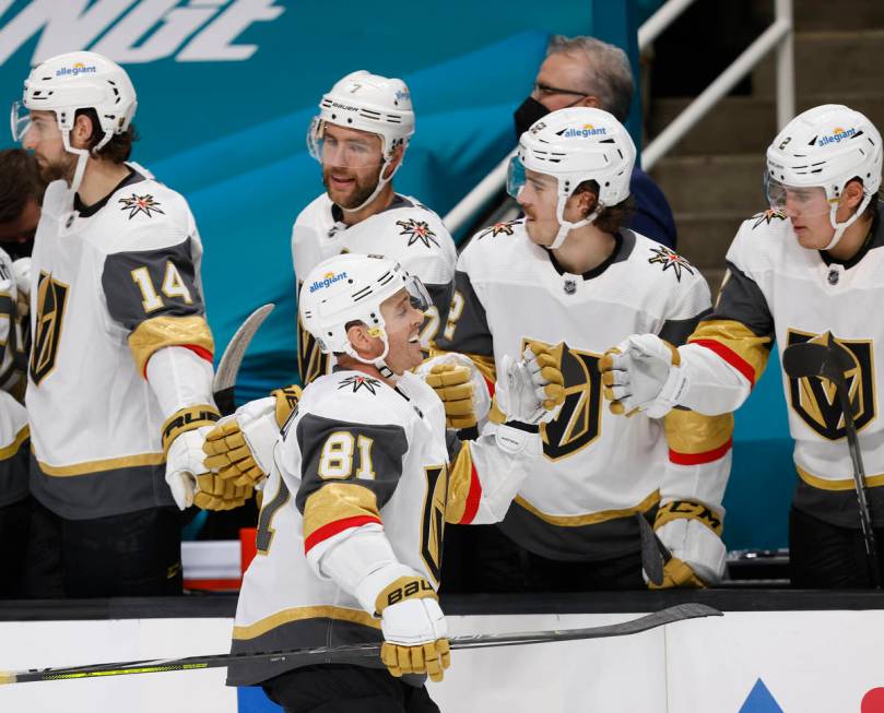 Vegas Golden Knights center Jonathan Marchessault (81) celebrates with the bench after scoring ...
