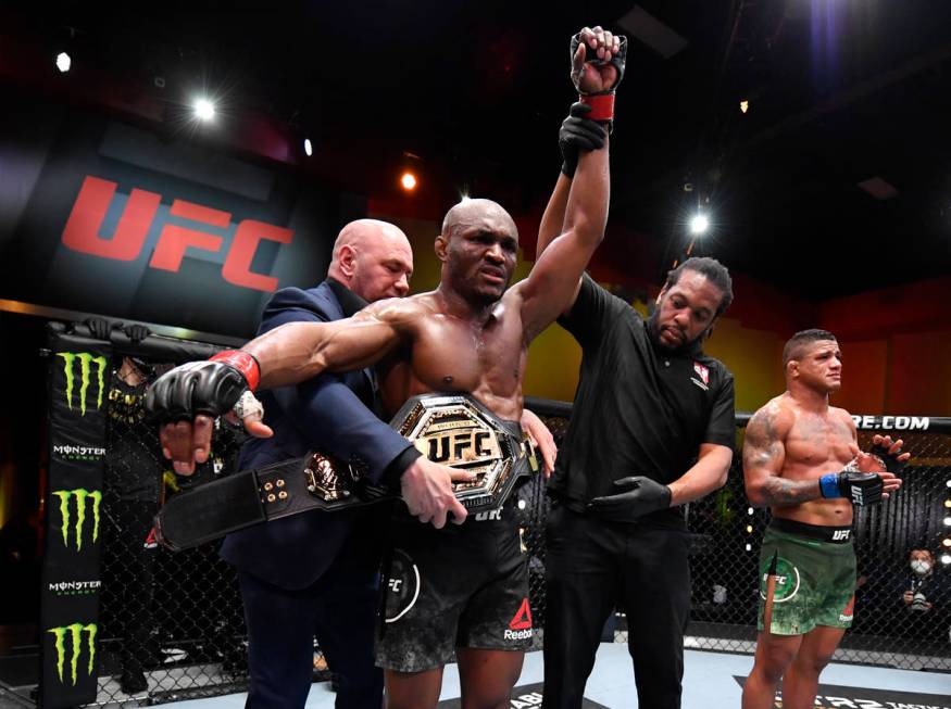 Kamaru Usman of Nigeria reacts after his victory over Gilbert Burns of Brazil in their UFC welt ...