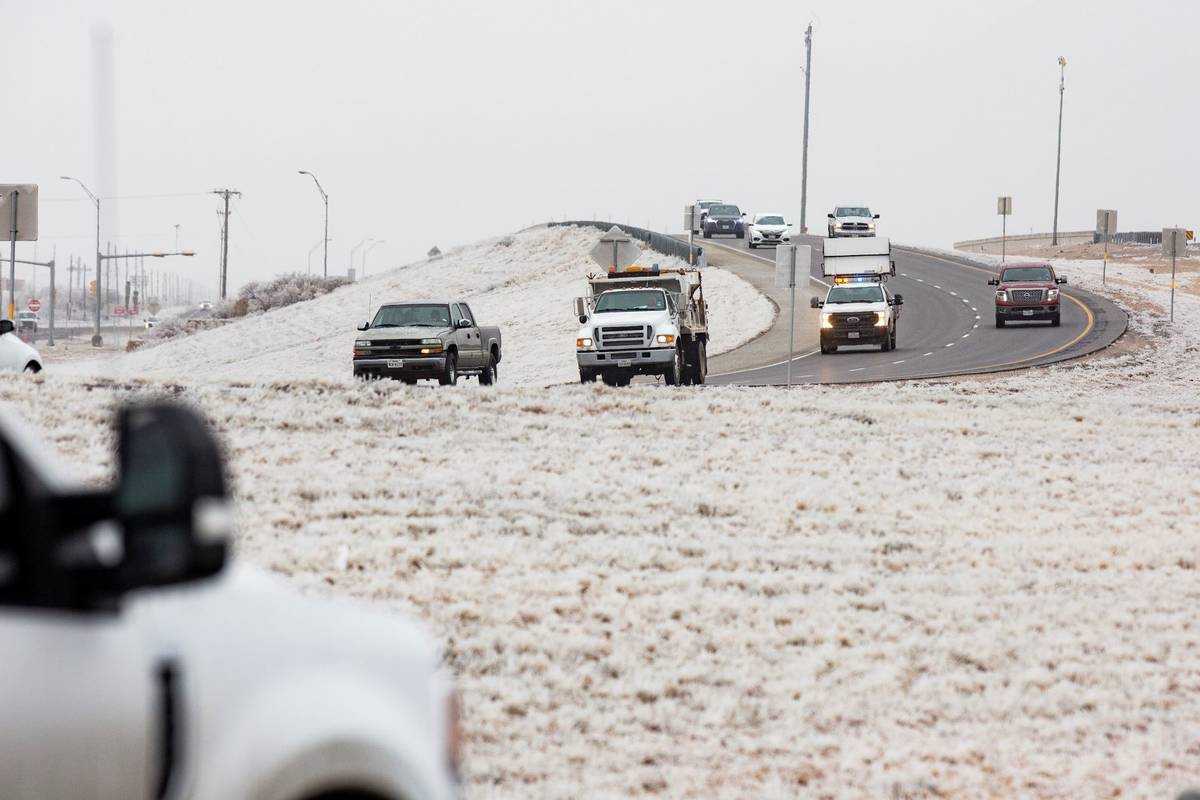 Motorists drive east on Texas State Highway 191 headed towards Midland from Odessa Friday, Feb. ...